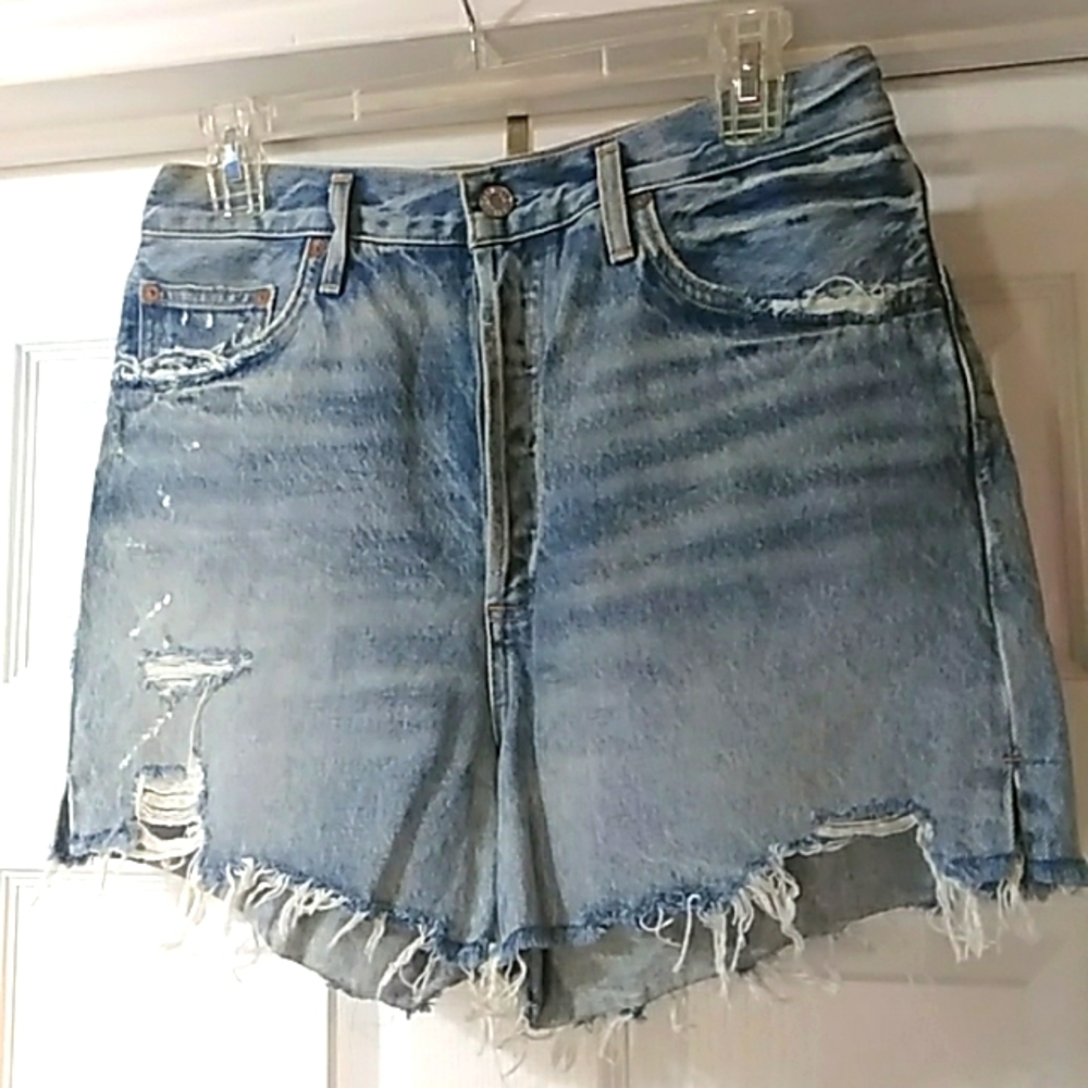 Agolde button fly denim distressed shorts size 30. Good pre-loved condition.